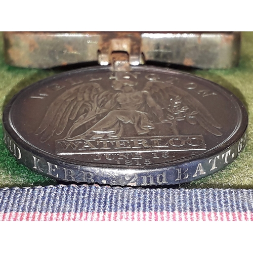 46 - A Waterloo Medal awarded to Sergeant Richard Kerr 2nd Battalion 69th Regiment Foot, stamped * SERJ. ... 