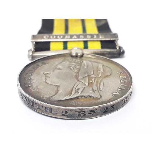 67 - Ashantee Medal 1873-1874, awarded to private T Smith 2/23rd Foot Royal Welsh Fusiliers, stamped '895... 