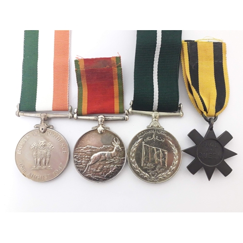 93 - A group of four assorted medals comprising an India Independence Medal awarded to '6844212 NK/W & W.... 