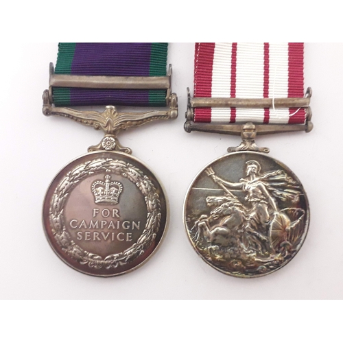 97 - Two Queen Elizabeth II medals: a Campaign Service Medal '24030868-SIG. R. J. TAYLOR. R. SIGS.' with ... 