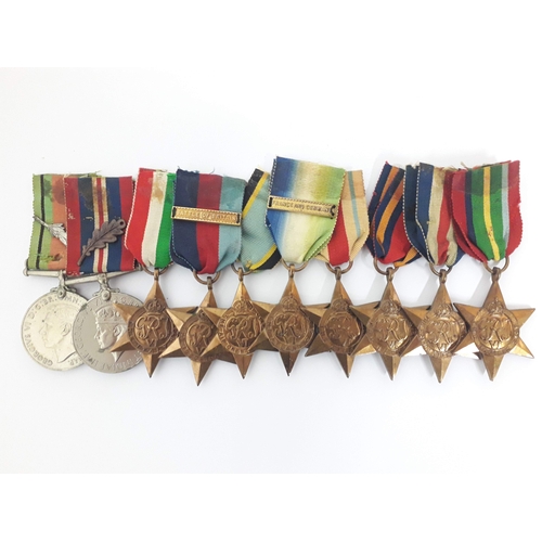 99 - A group of ten assorted WWII medals/stars comprising a Defence Medal, War Medal, Italy Star, 1939-19... 