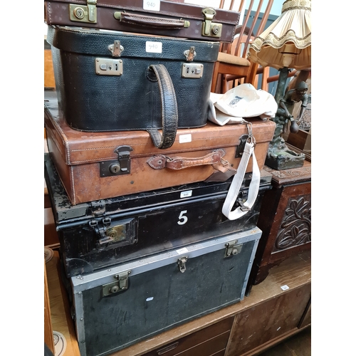 940 - Five Vintage cases and a Cunard Queen Elizebeth 2 bag.