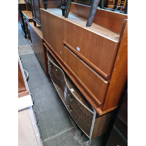 955 - A mid 20th century melamine dressing table together with a mid 20th century teak low sideboard.