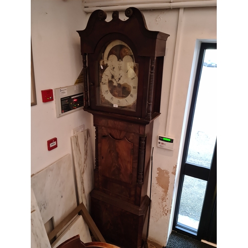 1060 - A Georgian mahogany eight day longcase clock with moon dial, weights and pendulum.