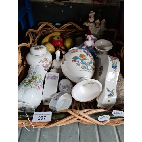 297 - A basket containing various items of pottery including Wedgwood, Aynsley, a Coalport figurine, a Wil... 