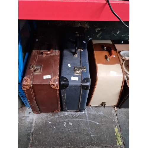 319 - 2 vintage cases and an Alfa electric sewing machine with pedal, in case.