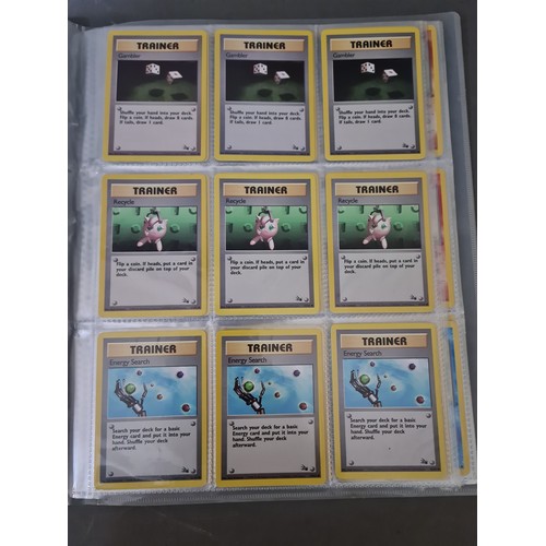 115 - A box containing two binders of vintage 1990s Pokemon cards together with a vintage Pokemon marble b... 