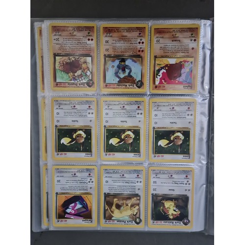 115 - A box containing two binders of vintage 1990s Pokemon cards together with a vintage Pokemon marble b... 