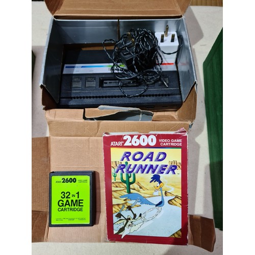 121 - Two Atari 2600 games consoles with assorted games, various Megadrive games and a PS1 with two contro... 