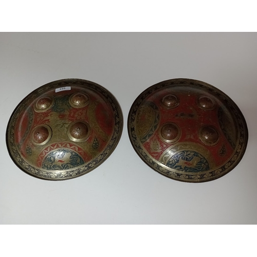 101 - A pair of Eastern hand shields, diameter 28cm.