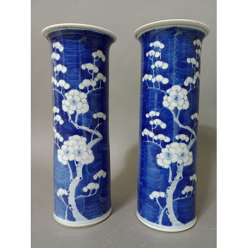 105 - A pair of Chinese porcelain blue and white sleeve vases, each bearing four character Kangxi mark, he... 