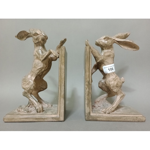 106 - A pair of composition bookends modelled as hares.