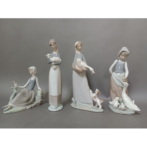 111 - Four Lladro figures.