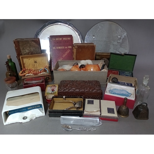 125 - A box of assorted collectables including books, card games, doll's tea set, glass bottles, costume j... 