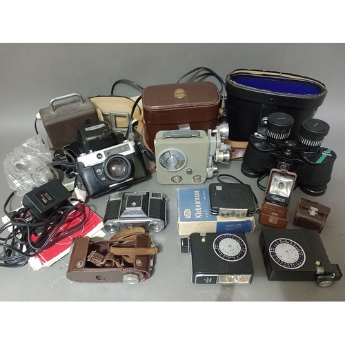 128 - Assorted cameras including a Zeiss Ikon, a Yashica Lynx 5000E, a cine camera, various accessories an... 