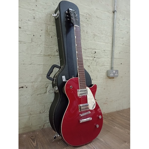 140 - A Gretsch Electromatic electric guitar, serial no. CYG15090413, with accessories and hard case.