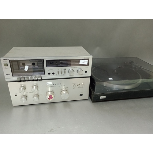 141 - A Sansui belt drive turntable SR-222MKII together with a Sharp stereo cassette deck RT-100 and a Tri... 