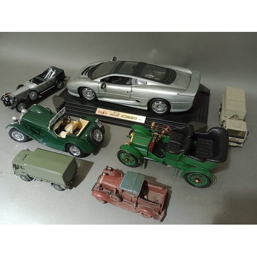150 - A box of various toy models to include a 1992 Maisto Jaguar XJ220, 2 Leyland trucks, a Franklin Mint... 