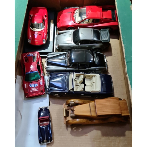 151 - A box of model cars to include Ferrari, Rolls-Royce, etc