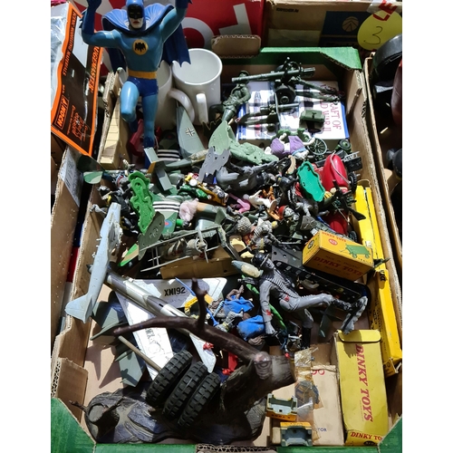 153 - A box of toys and figures, mainly military to include Dinky, plastic, metal, soldiers, etc.