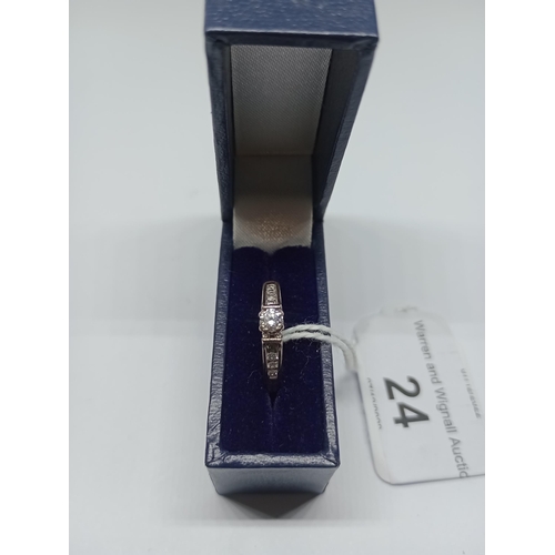20 - A white metal diamond ring, marked DIA 0.25 ct in associated box, size I/J, wt. 3.6g.