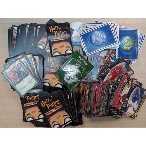 406 - A box of Panini football cards and Harry Potter cards.