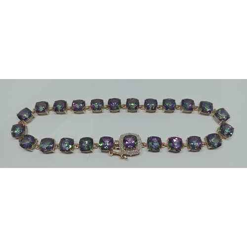 17 - A coated topaz bracelet, marked '9K' and with import marks, gross wt. 9.6g, length approx. 20cm.