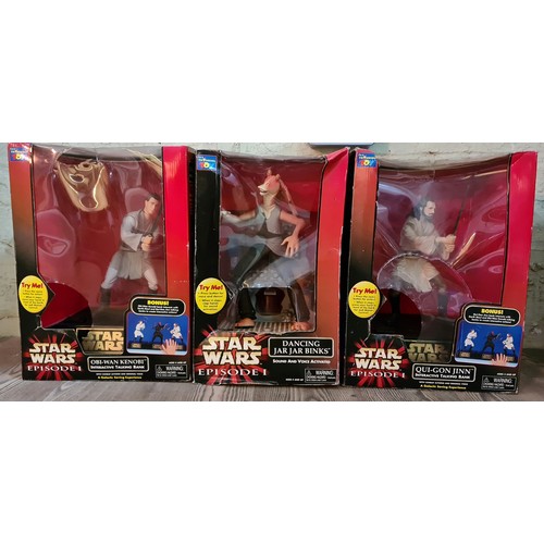 175 - Three large boxed Star Wars toys to include Obi-Wan Kenobi interacting talking bank, Qui-Gon Jinn in... 