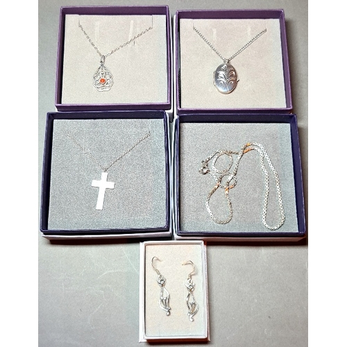 30 - Four silver necklaces, lengths 45cm, pendants comprising crucifix, locket, filigree and coral, also ... 