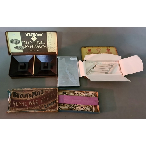 60 - A mixed lot of smoking items including a tin of 1920s Pera cigarettes, stacking Bakelite ashtrays, o... 