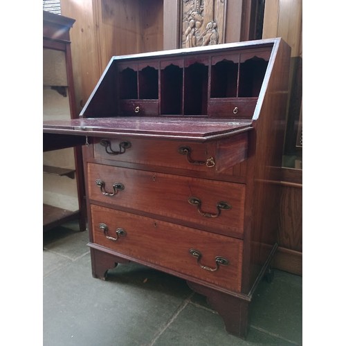 947 - An Edwardian inlaid mahogany bureau.