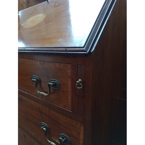 947 - An Edwardian inlaid mahogany bureau.