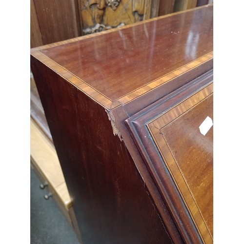 947 - An Edwardian inlaid mahogany bureau.