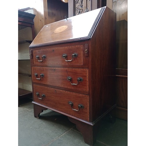 947 - An Edwardian inlaid mahogany bureau.