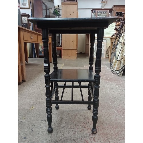 945 - A late Victorian Aesthetic Movement ebonised table in the manner of E W Godwin, together with a maho... 