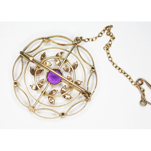 12 - An early 20th century pearl and amethyst brooch, diameter 30mm, marked '15ct', gross wt. 5.3g.