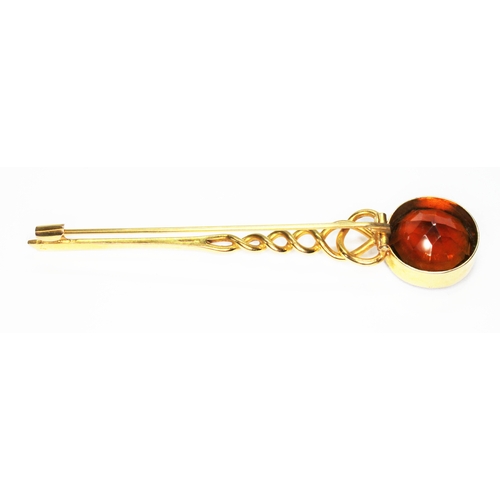 5 - A Scottish provincial kilt pin, early 20th century, of twist form and terminating with a millegrain ... 