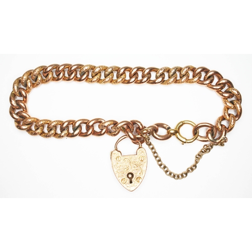 8 - An early 20th century engraved link bracelet with heart shaped padlock clasp, marked '9c', length 20... 