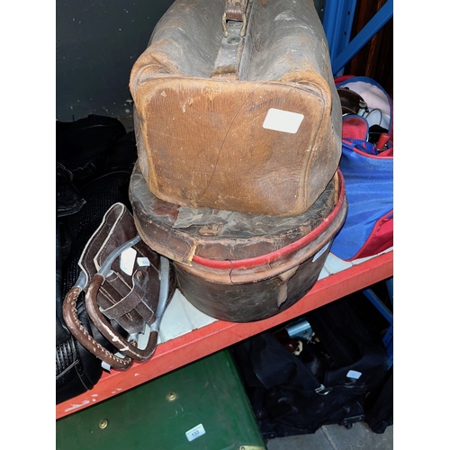 130 - An old leather hat's box, a Gladstone type bag and a shooting stick.