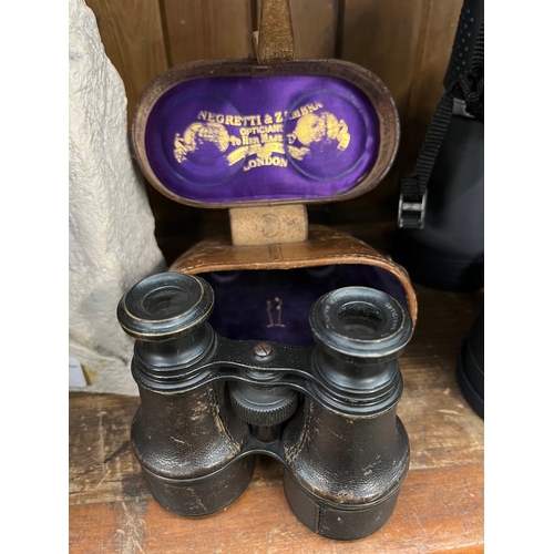 37 - A pair of vintage Negretti & Zambra binoculars in original fitted leather case.