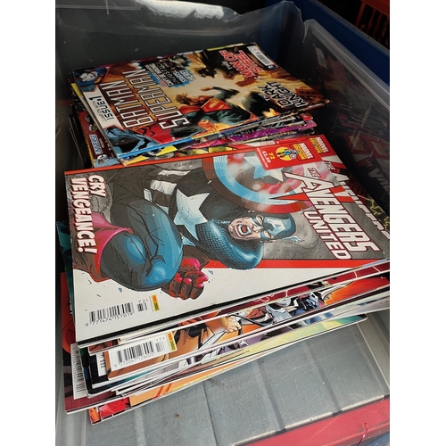 293 - A box of comics.