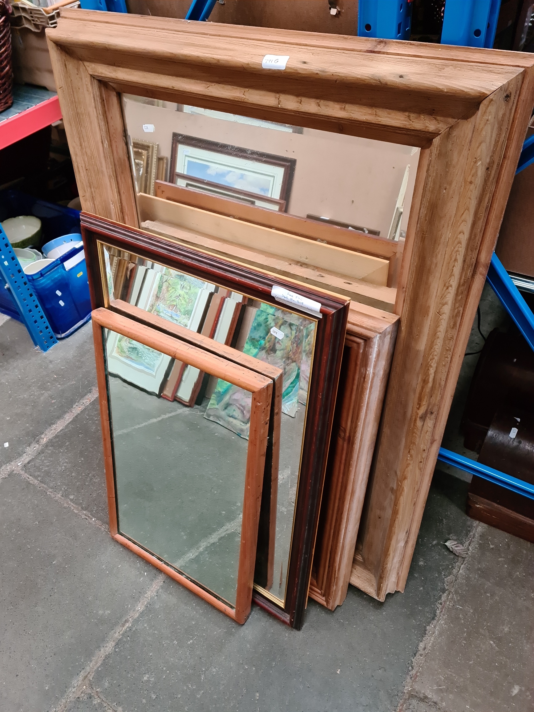 Two large pine framed mirrors and another.