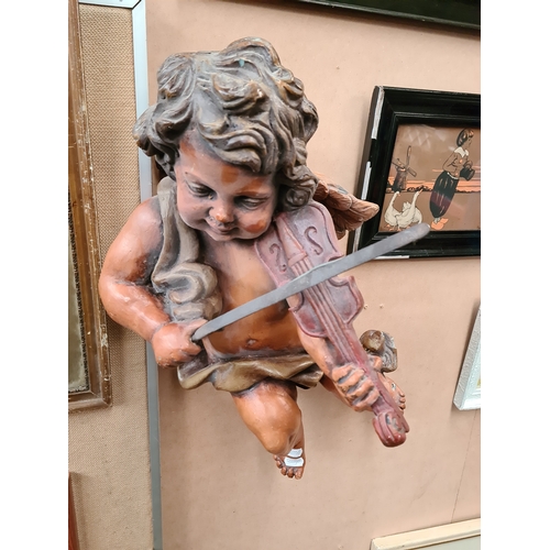 799Q - A vintage hanging figure of a cherub playing a violin.