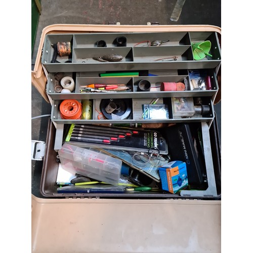 132 - 2 baskets and a toolbox of various fishing equipment to include reels, floats, weights, etc.