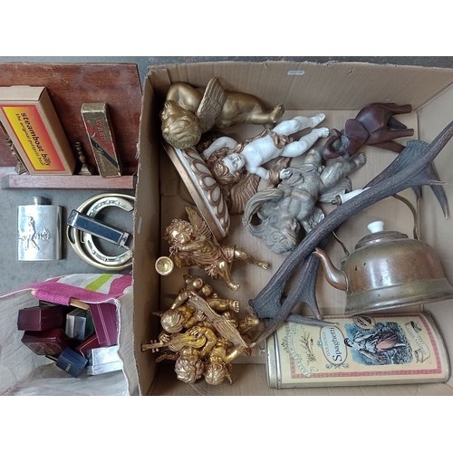 157 - A boxed of mixed collectables including cherubs, antlers, jewellery boxes, copper kettle, harmonicas... 