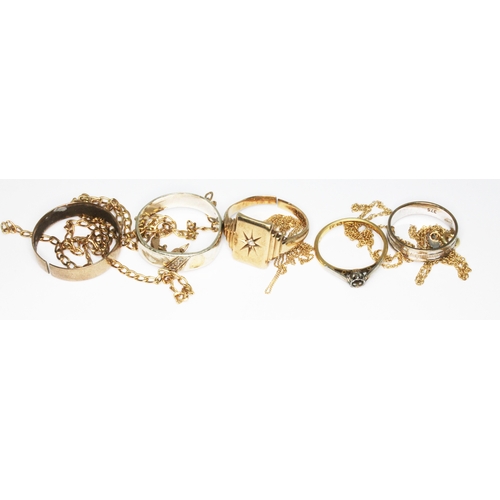 32 - A mixed lot comprising five rings; one marked '18ct', the others hallmarked 9ct gold or marked '375'... 