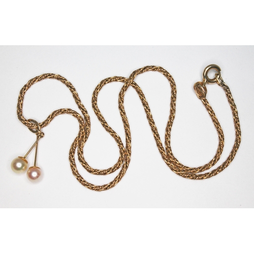 53 - A hallmarked 9ct gold cultured pearl drop pendant on fancy twist chain, length 34cm, gross wt. 4.7g.