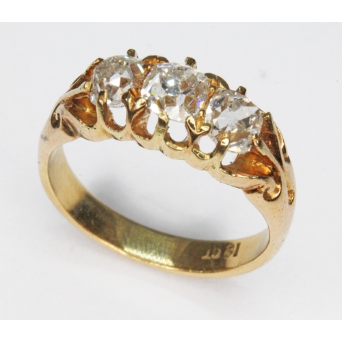 80 - An antique three stone diamond ring, the old cushion cut stones weighing approx. 0.31, 0.53 & 0.39 c... 