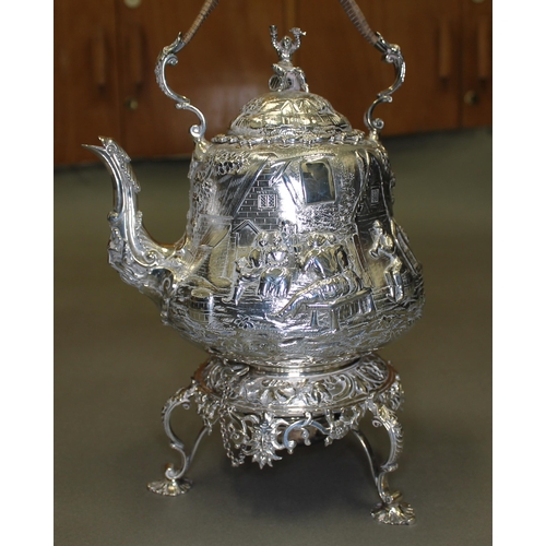 151 - A Victorian matched four piece silver tea set, decorated all over with in repousse depicting joyful ... 