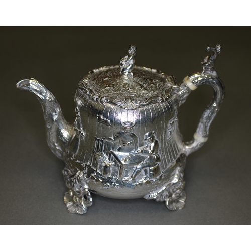 151 - A Victorian matched four piece silver tea set, decorated all over with in repousse depicting joyful ... 